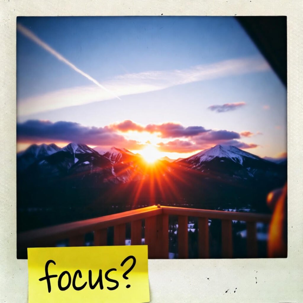 Polaroid sunrise with "focus?" note.
