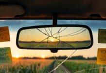 How to Overcome Self-Doubt and Achieve Continuous Self-Improvement Cracked mirror, donut, sticky notes—self-doubt dawn.