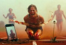 Real Athlete Success Stories That Show the Power of Persistence and Hard Work Muddy runner ugly-cries breaking finish tape