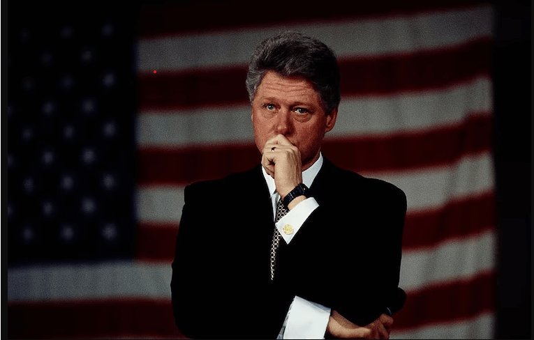 Portrait of emotional United States President Bill Clinton in front of the US flag. Clinton was the 42nd President of the United States during 1993 to 2001. (Photo by Â© Shepard Sherbell/CORBIS SABA/Corbis via Getty Images)
