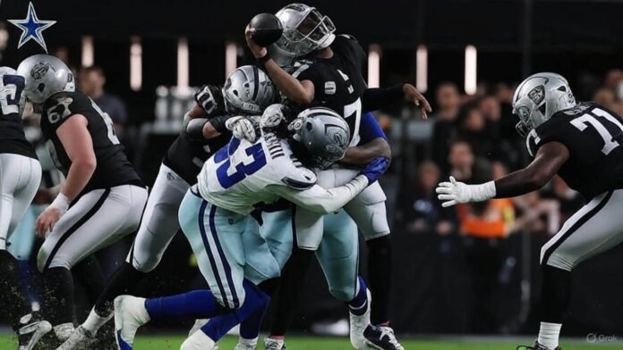 Dallas Cowboys' Micah Parsons sacks Las Vegas Raiders quarterback Aidan O'Connell mid-pass. Dallas Cowboys' Micah Parsons sacks Las Vegas Raiders quarterback Aidan O'Connell mid-pass.